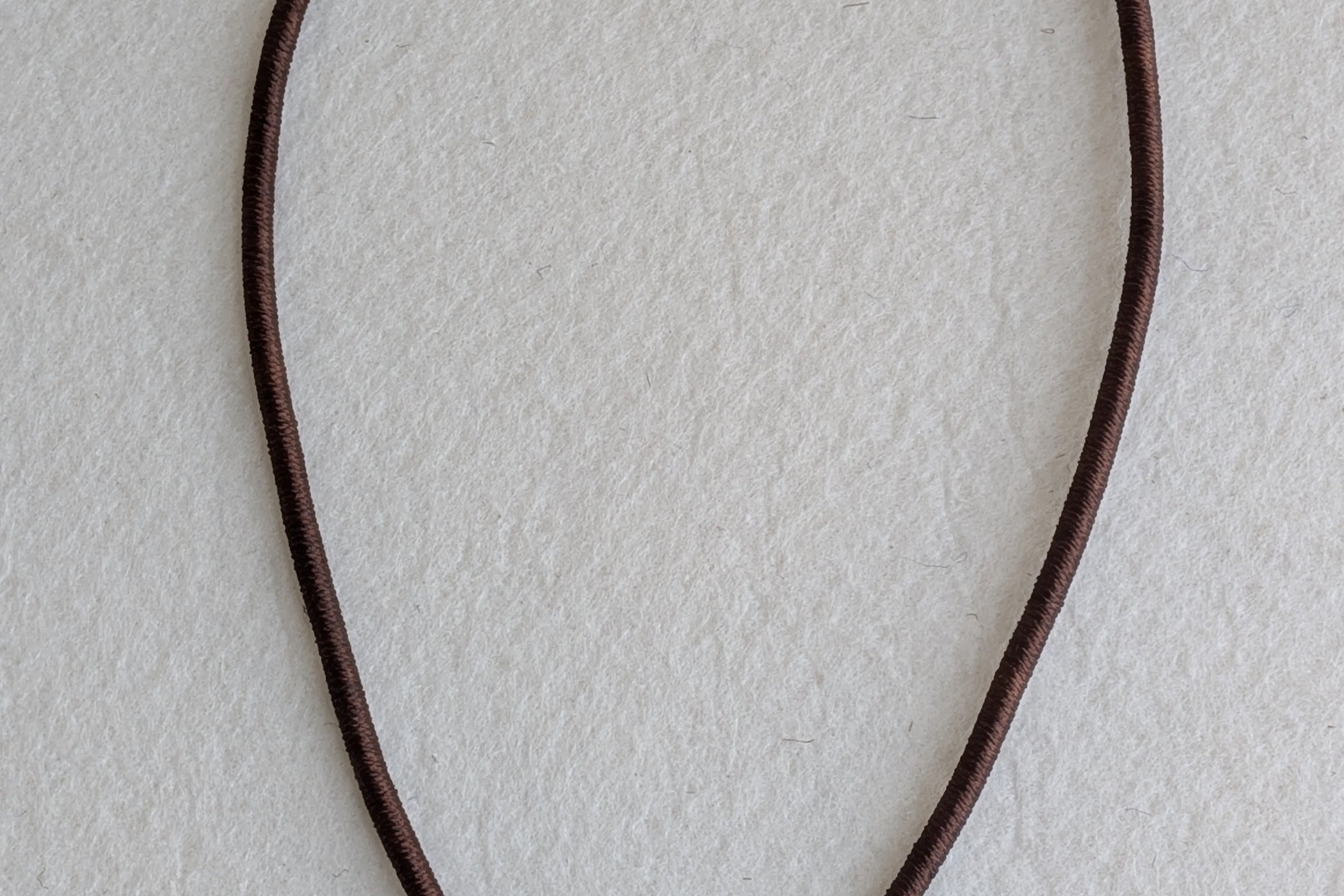Dhara - Statement piece with round 925 Silver pendant and brown dori