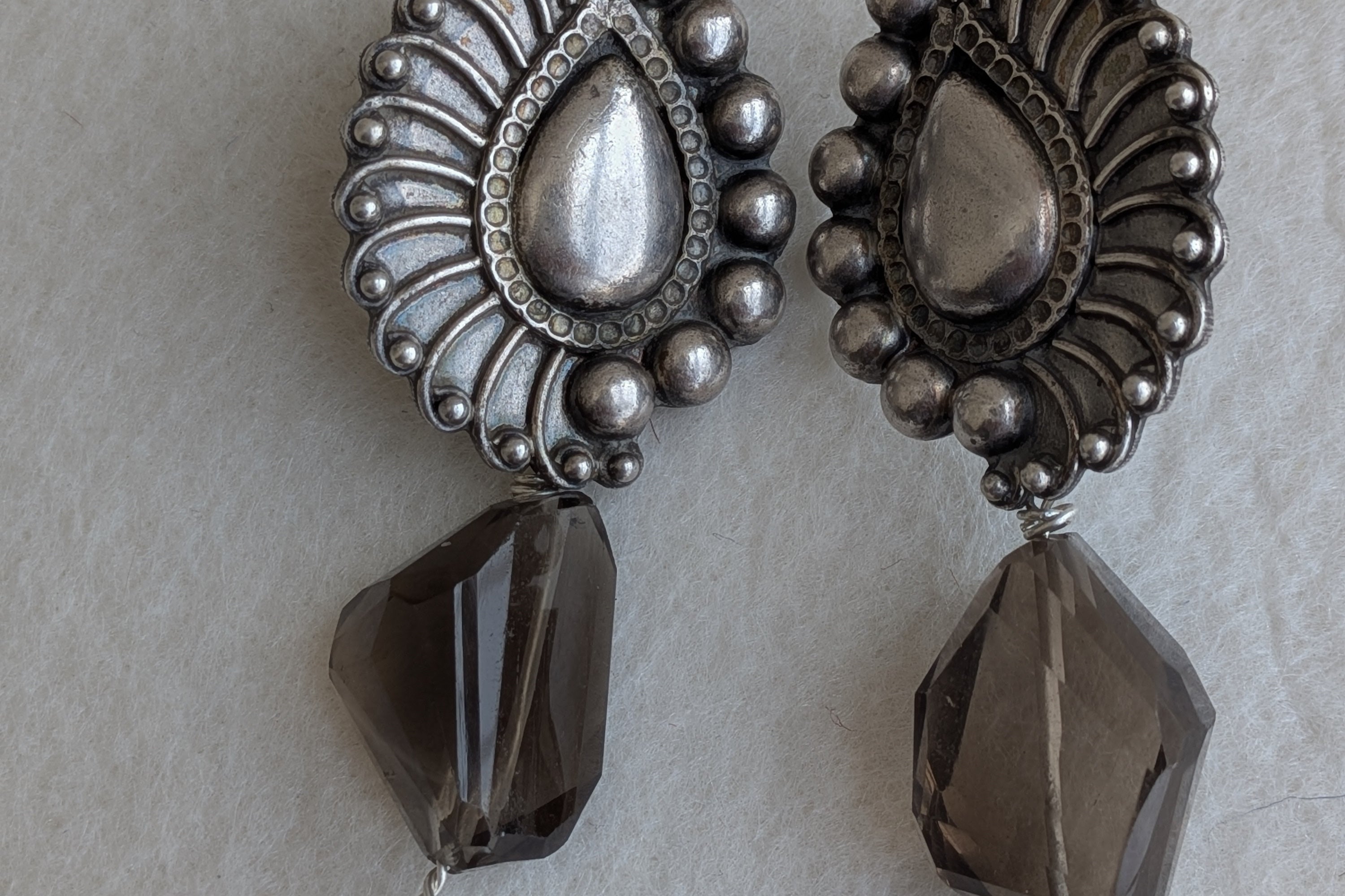 Morni - Peacock Feather 925 Silver Tops adorned with original smokey quartz nuggets