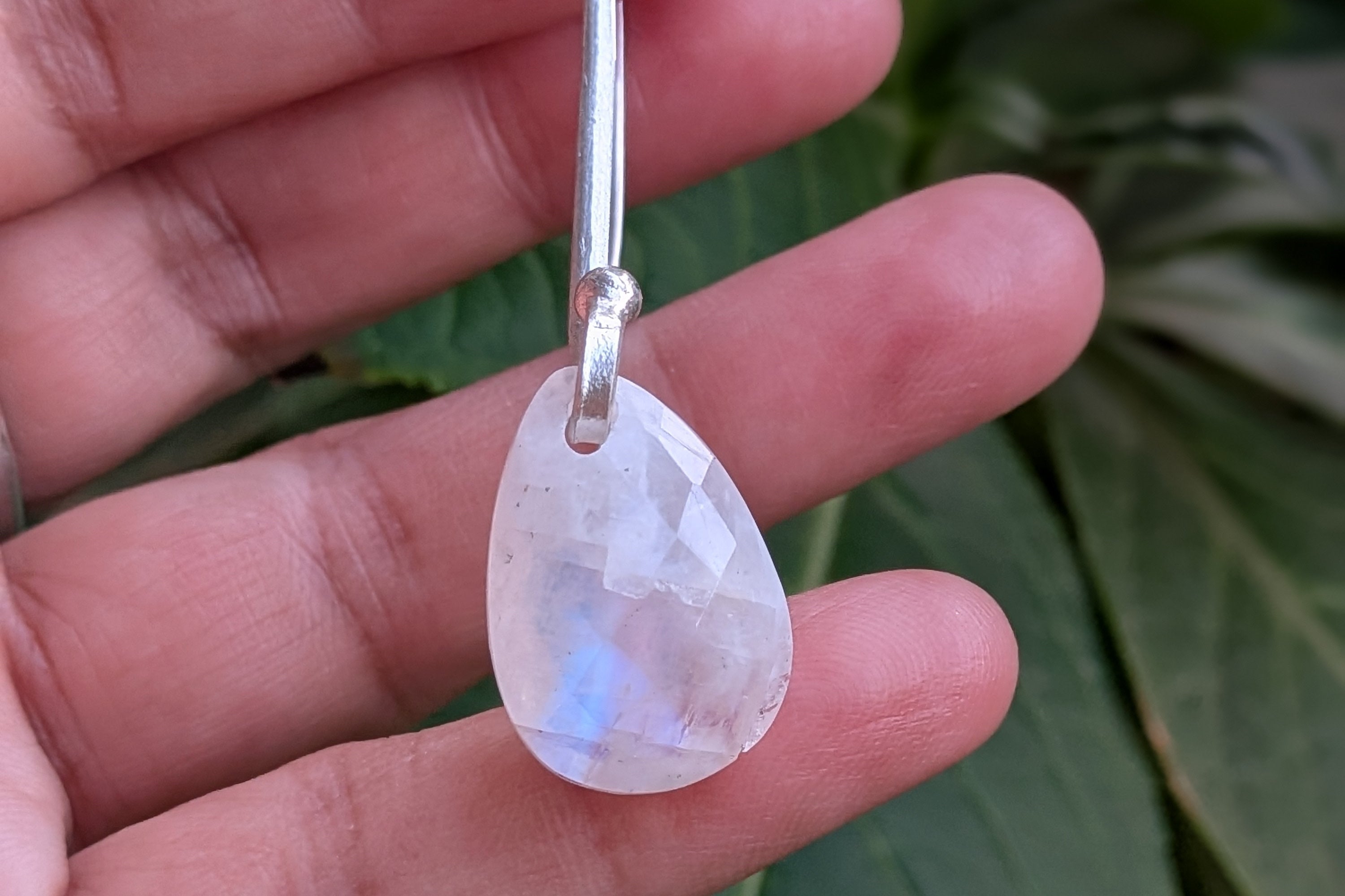 Handcrafted 925 sterling silver U-hook earrings with genuine Rainbow Moonstone drop. Ethereal shimmer, prosperity energy, and everyday luxury