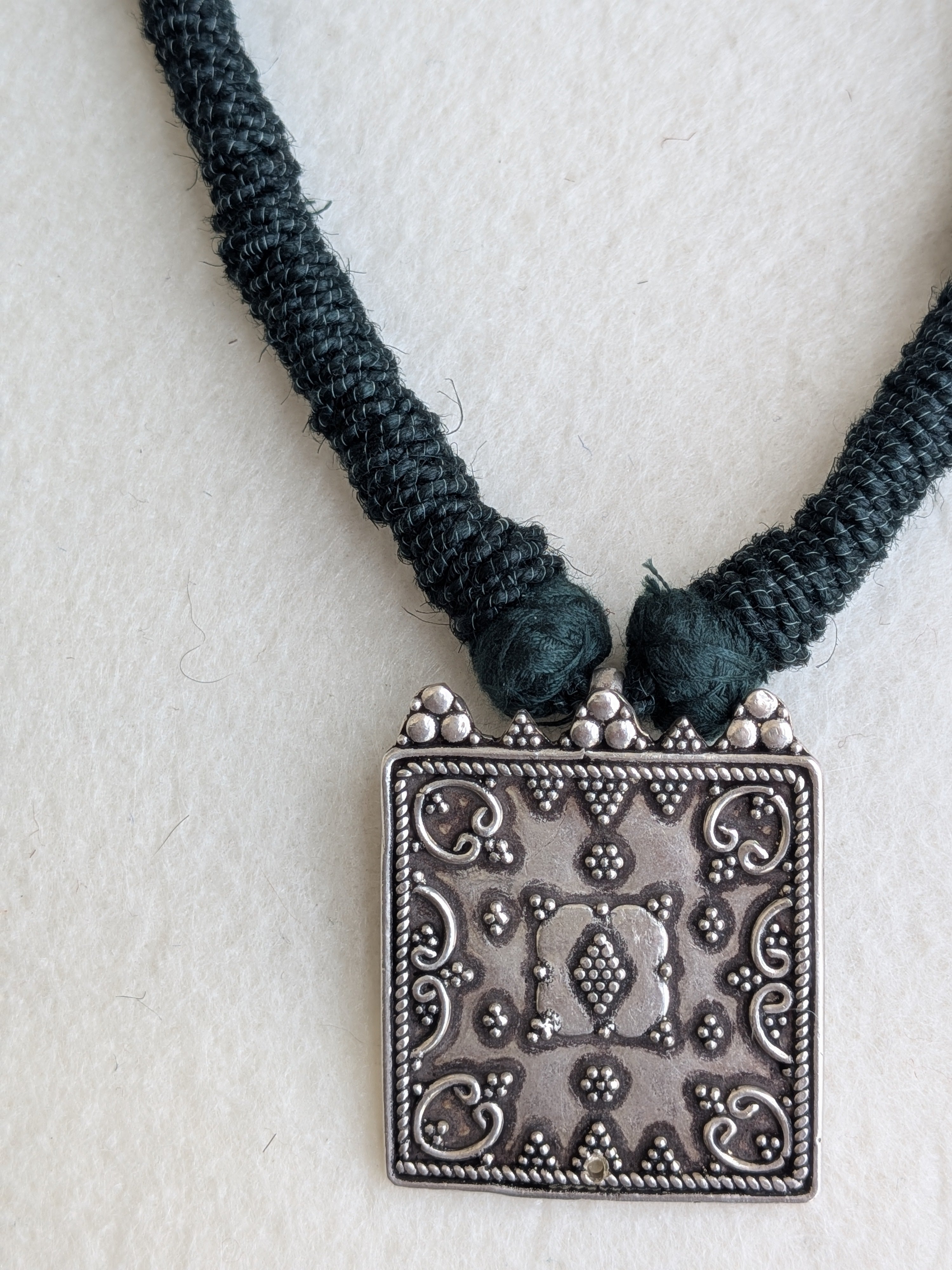 Tara - Unique square shaped 925 sterling silver pendant suspended on a natural jute dori