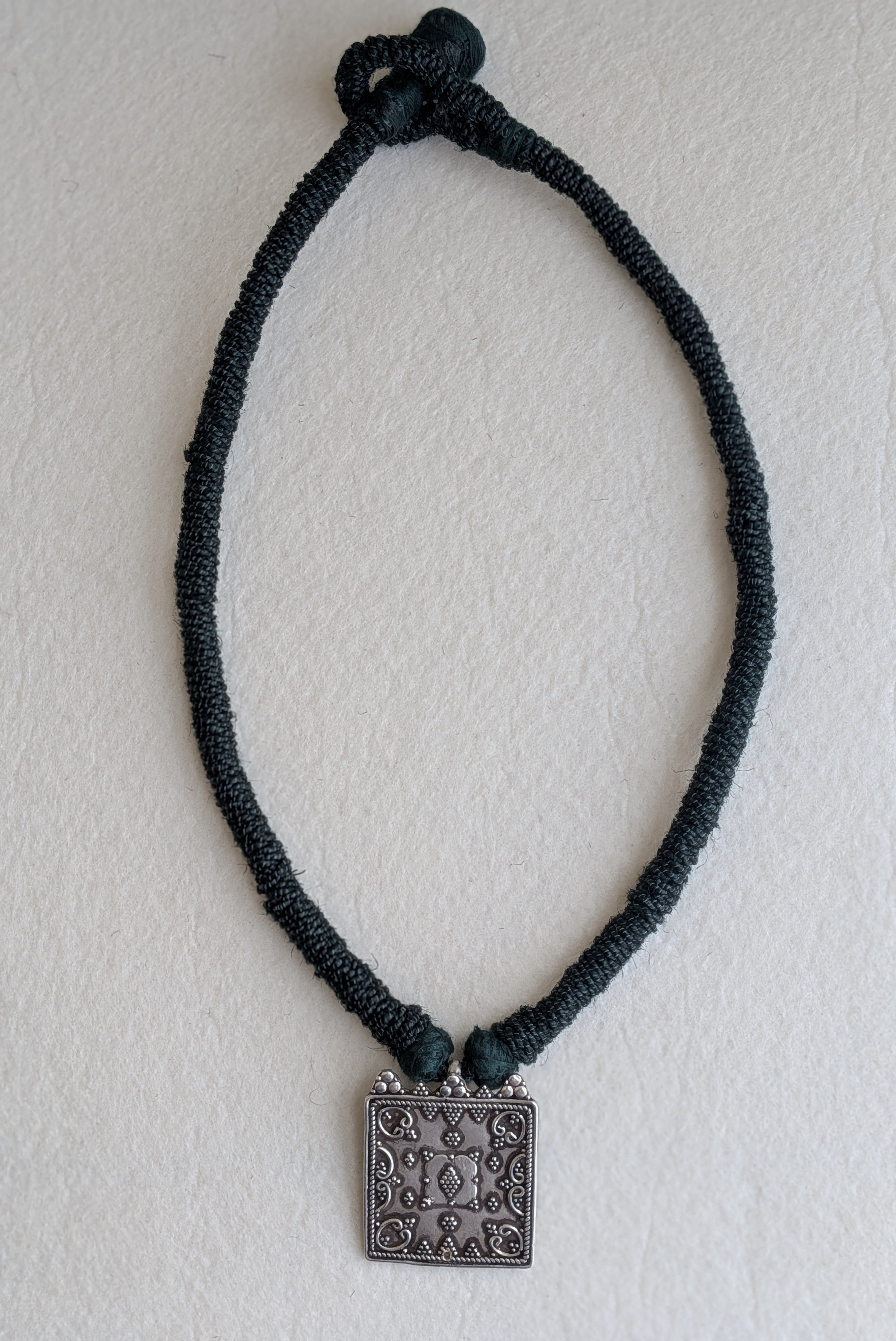 Tara - Unique square shaped 925 sterling silver pendant suspended on a natural jute dori