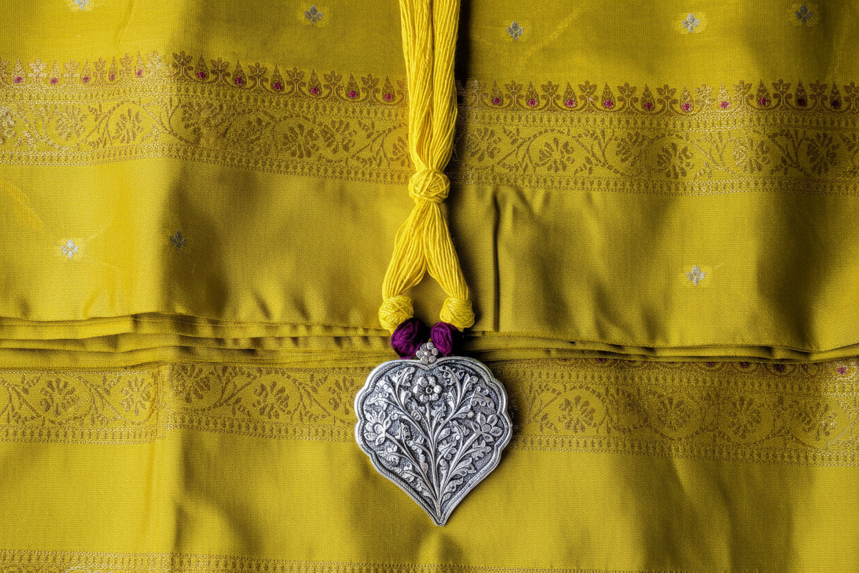 Handcrafted 925 silver big leaf pendant on a 21-inch yellow and purple thread dori