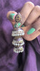 Handcrafted 925 silver jhumkas with traditional Meena enamel work and freshwater pearls. A festive, heirloom-worthy statement earring from Artificcers.